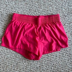 Fabletics Breathe Mid-Rise Run in Lipstick Red/Reflective Silver size Small